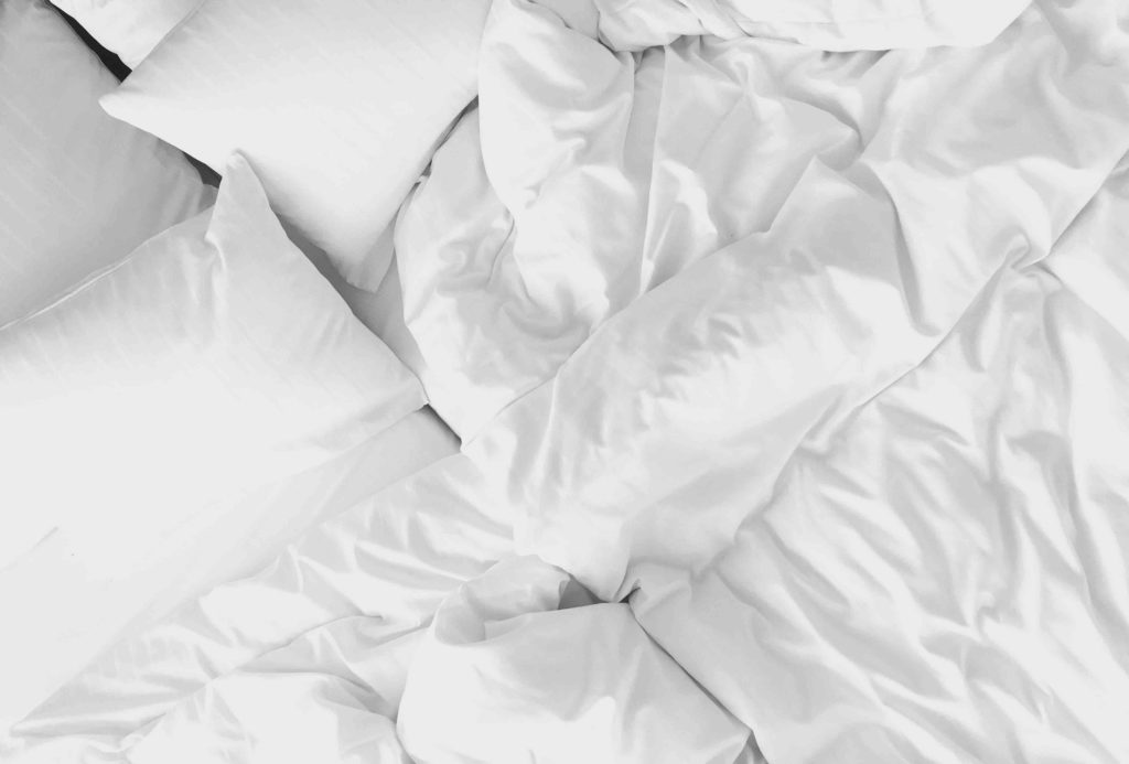 Crumpled white bedding