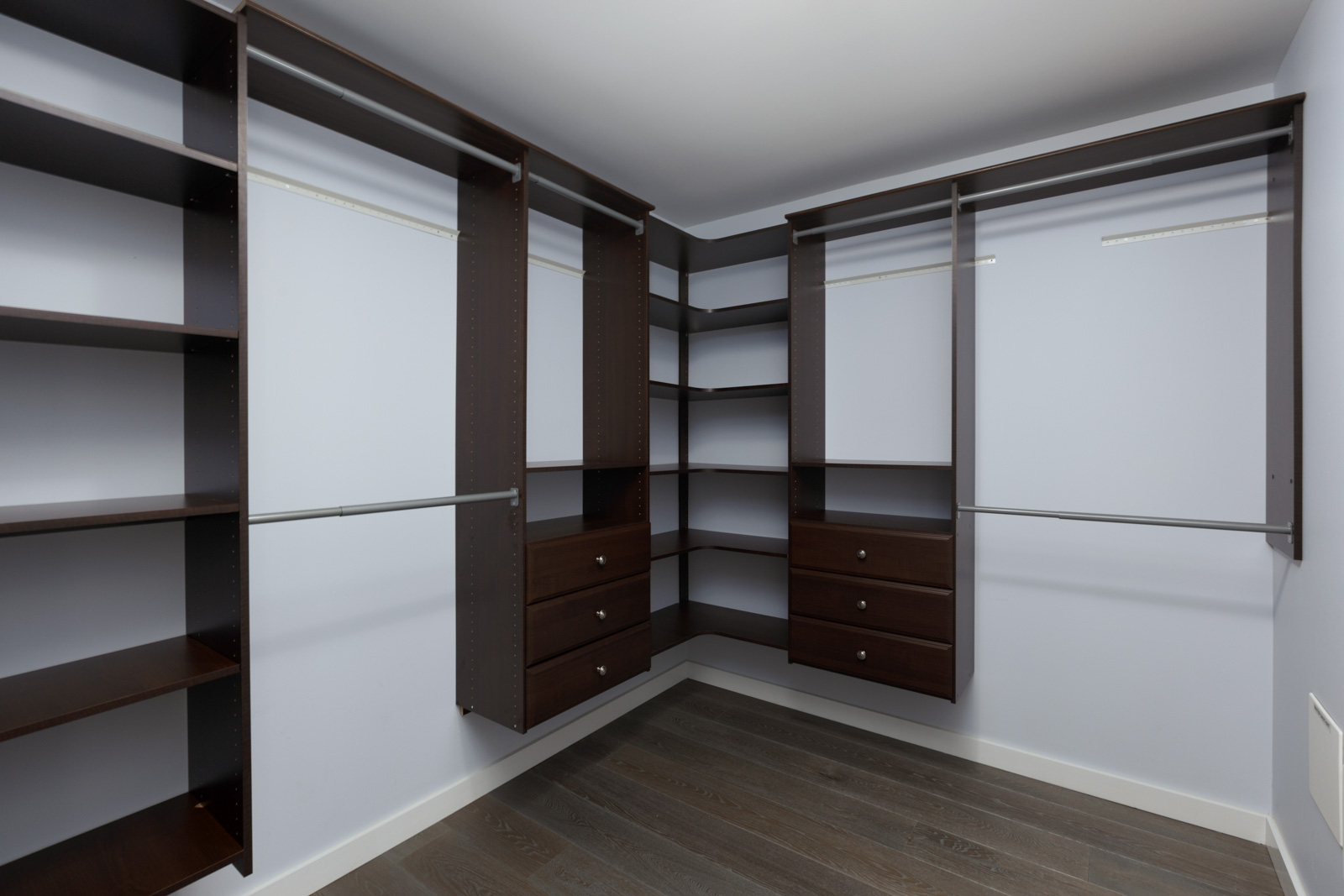 walk in closet with wooden shelves in rental penthouse condo in yaletown