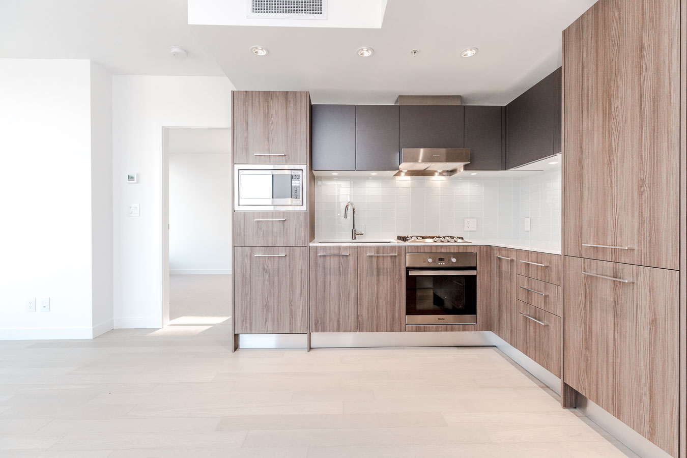 Kitchen with stainless steel appliances at Vancouver condo rental.