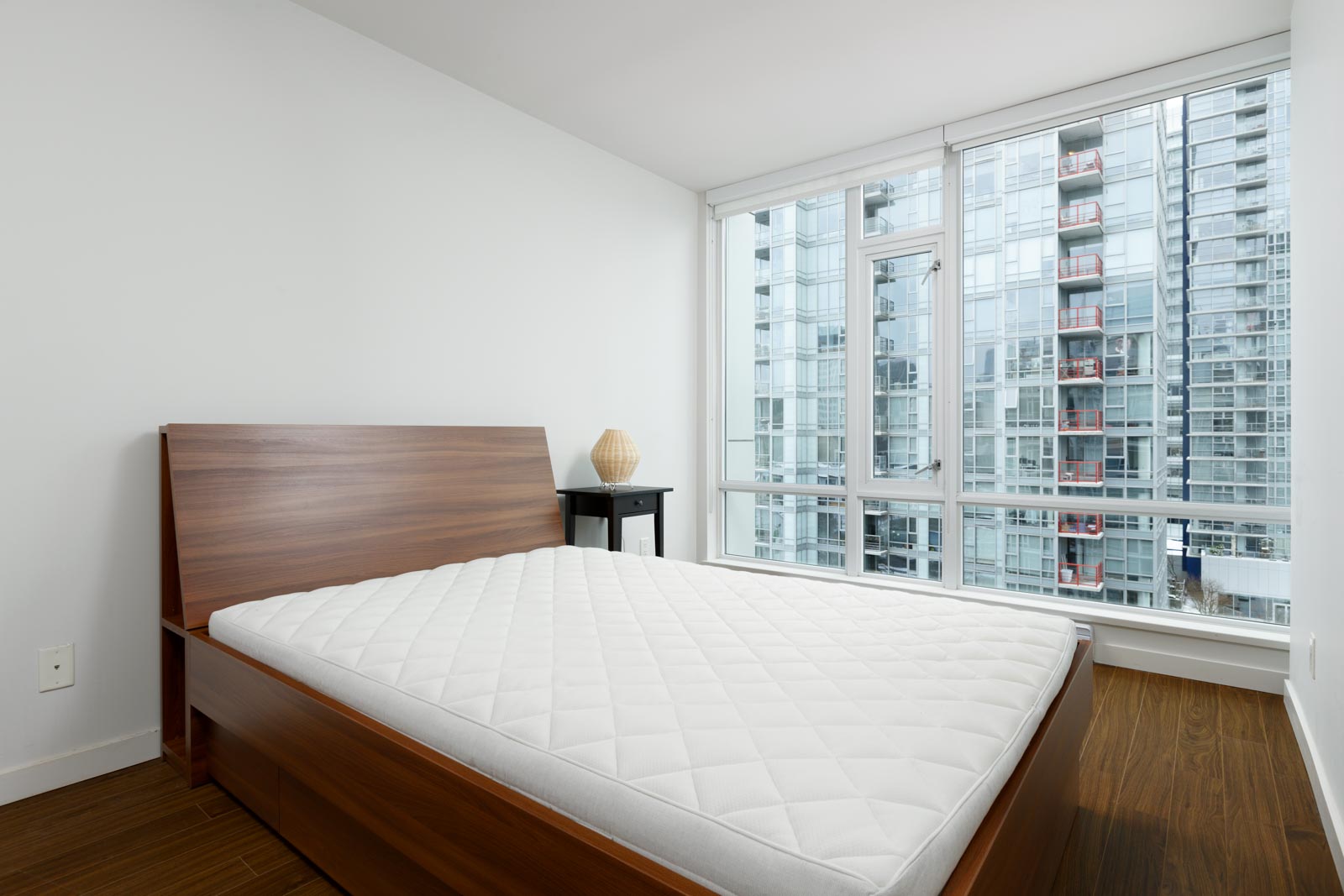 Bedroom with view at Downtown Vancouver condo rental.