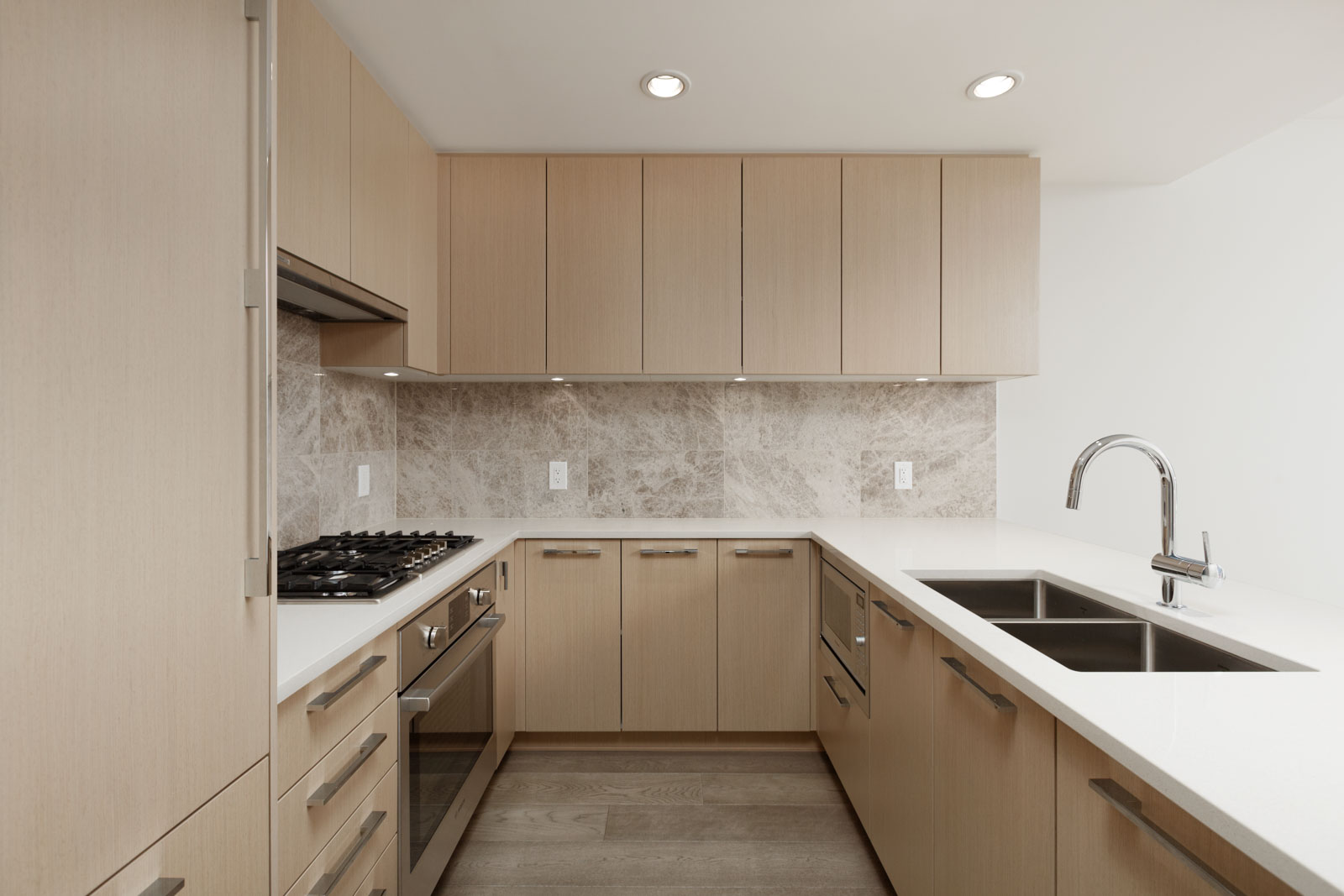 Kitchen with stainless steel appliances in UBC rental condo.