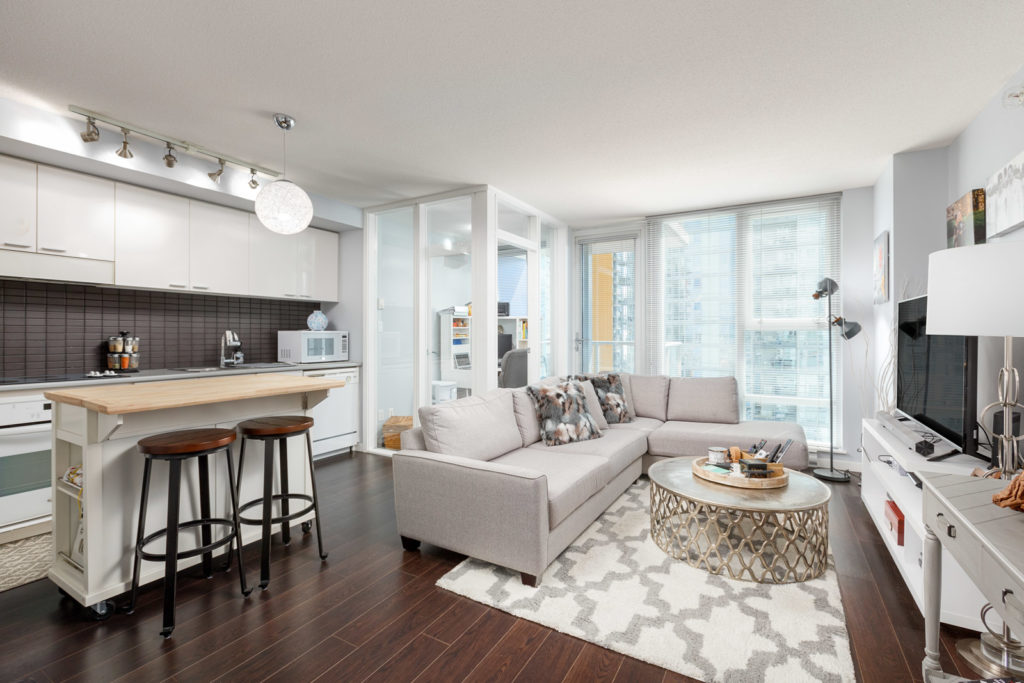 Living area in Downtown Vancouver rental condo with access to views of the city.