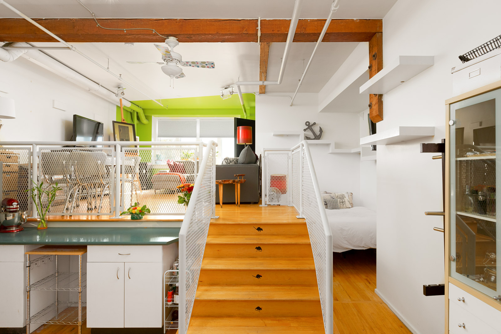 steps in a rental condo with old wood beams