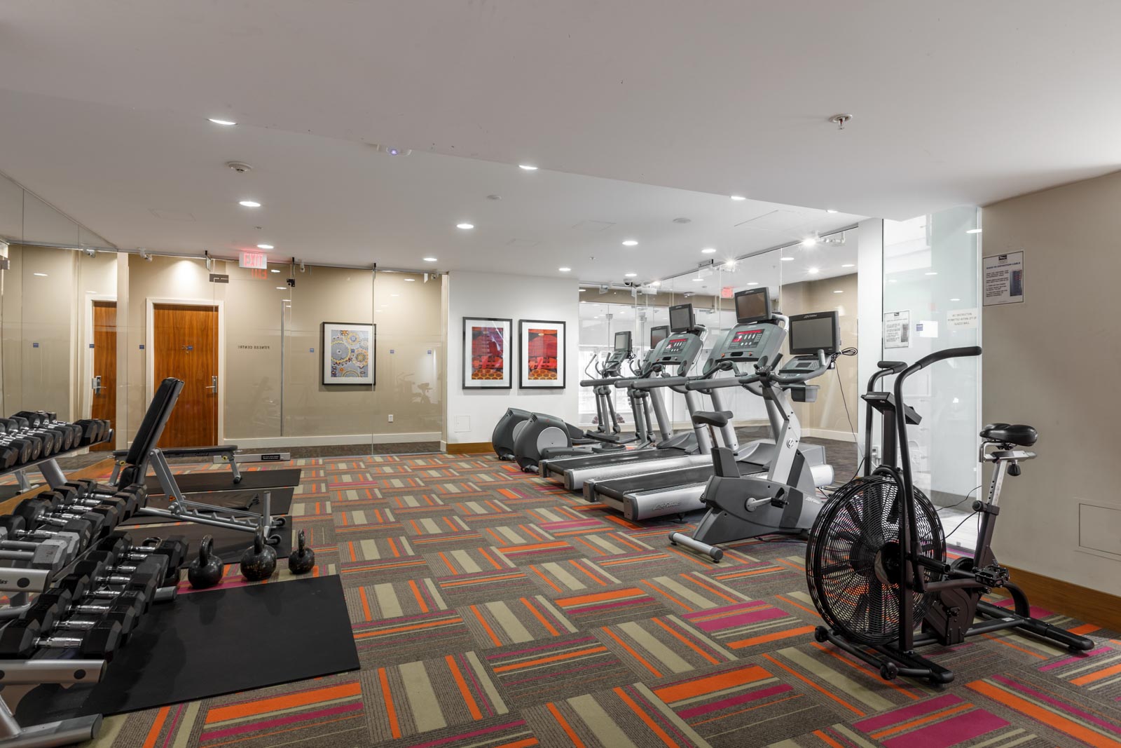 gym facilities wuth treadmills and elliptical machines in condo building kayak at 1633 ontario street in olympic village vancouver