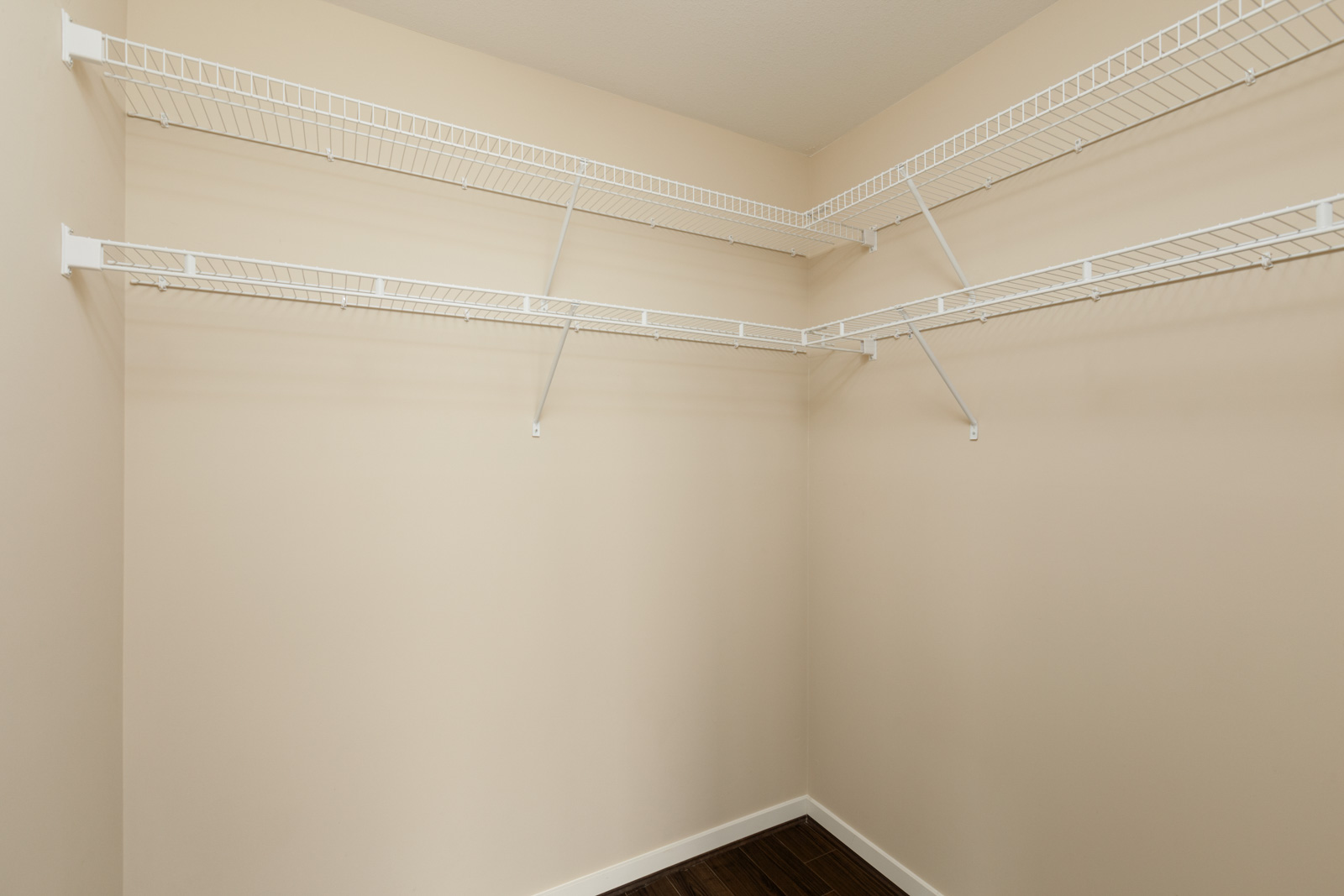walk in closet and high racks in a rental condo in richmond at remy on stolberg managed by birds nest properties