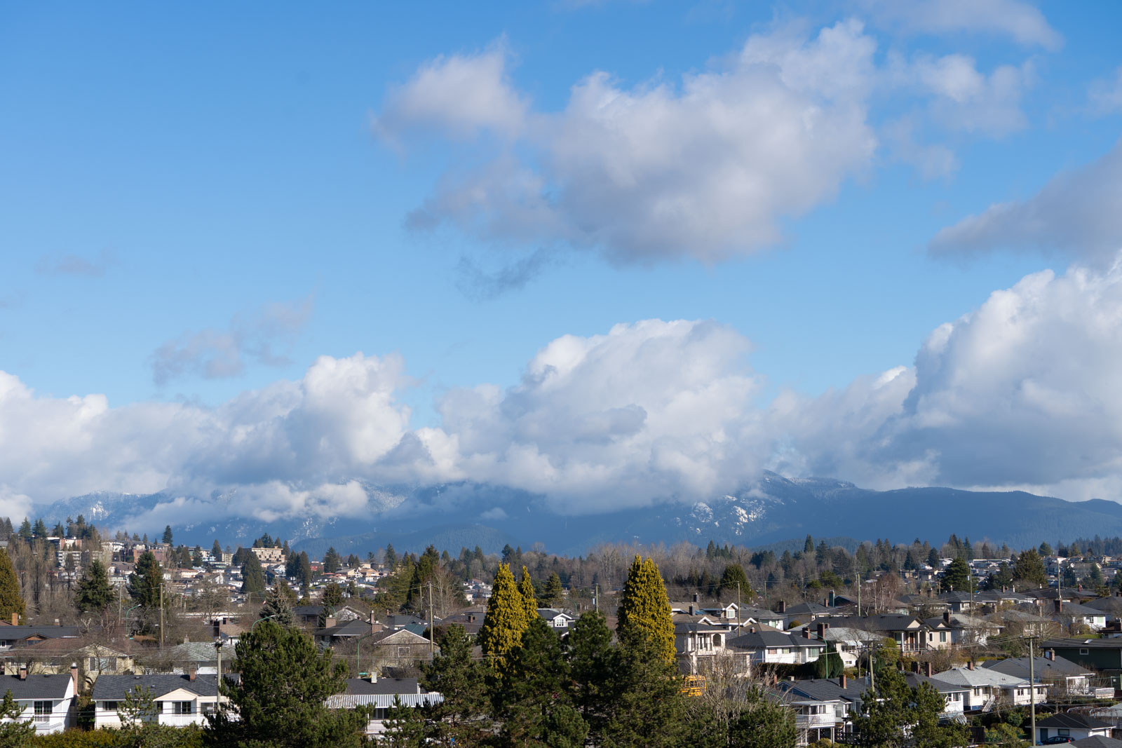 beautiful view of the mountains in the city of vancouver managed by birds nest properties