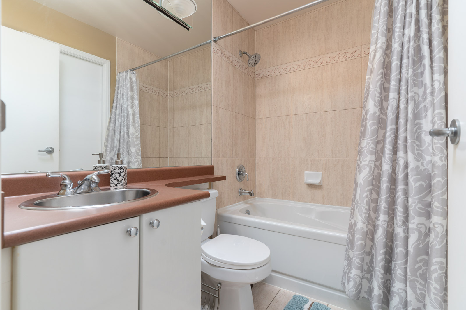 bathroom with all the basic amenities in a home managed by Birds Nest Properties