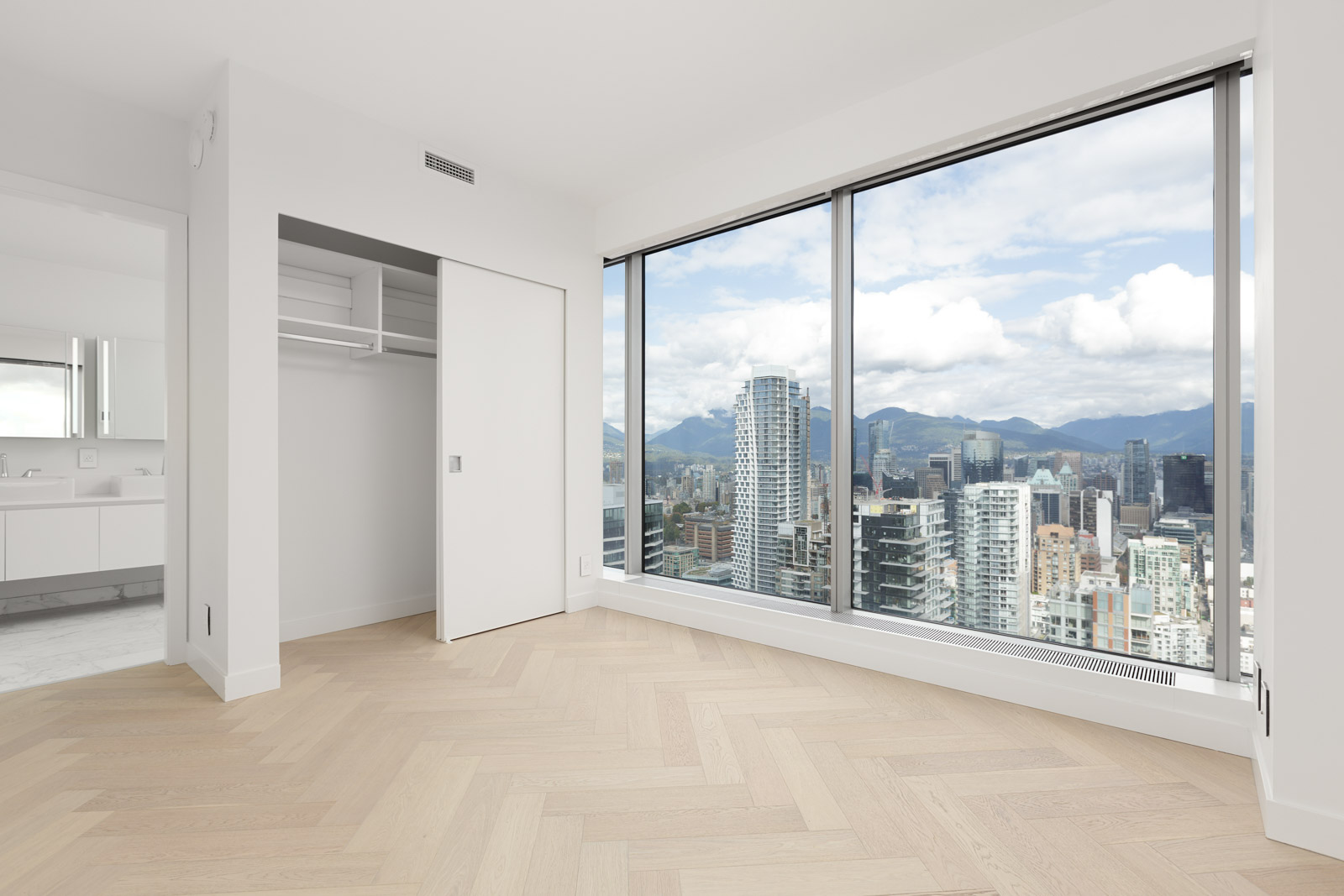 bedroom with view in upscale downtown Vancouver condo