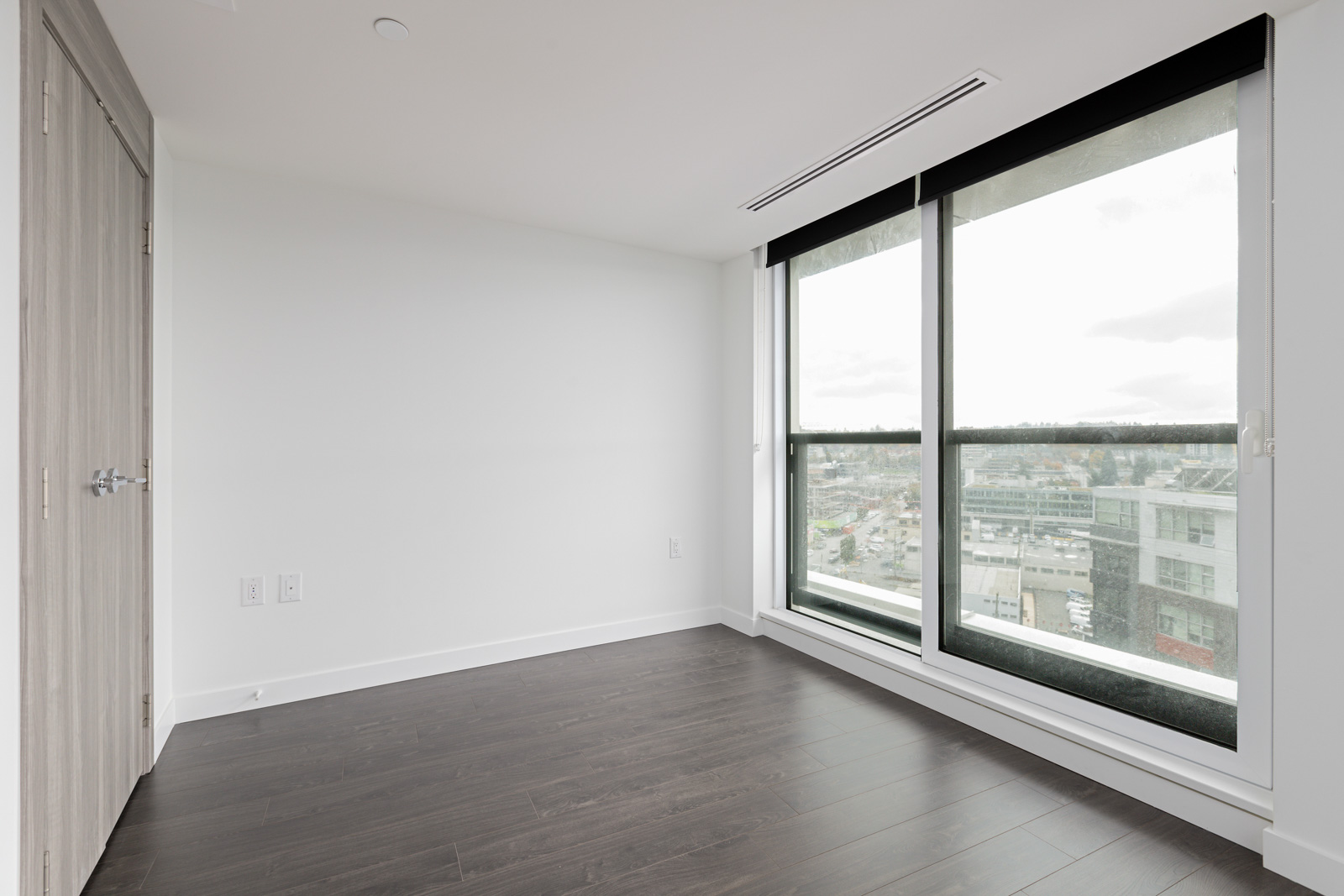 living room in newly built Olympic Village condo