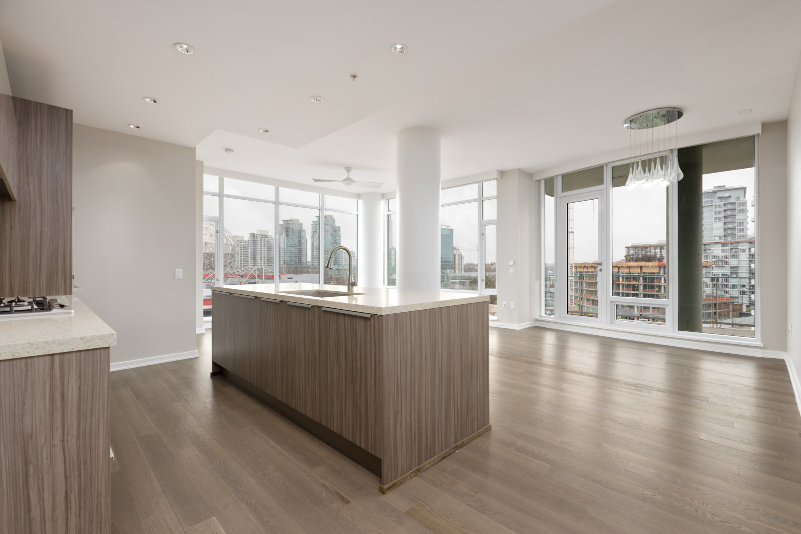 kitchen island with large widow view of false creek