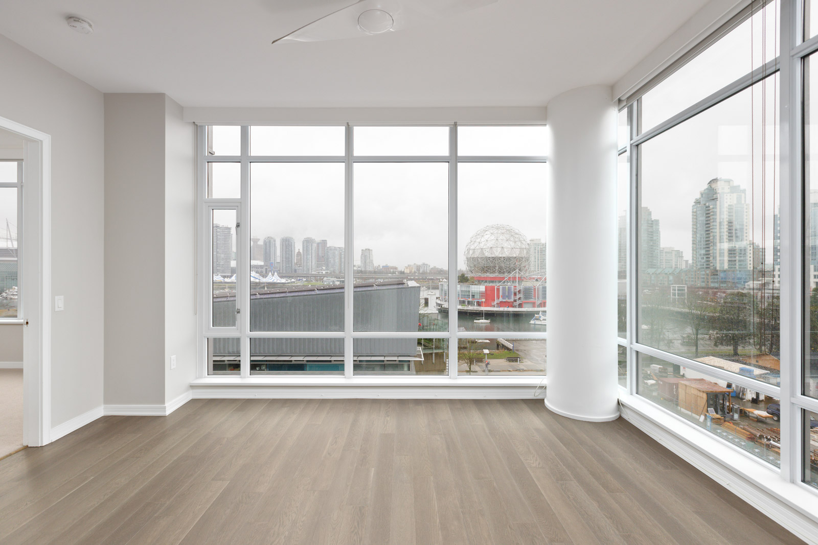 floor-to-ceiling windows with view of science world