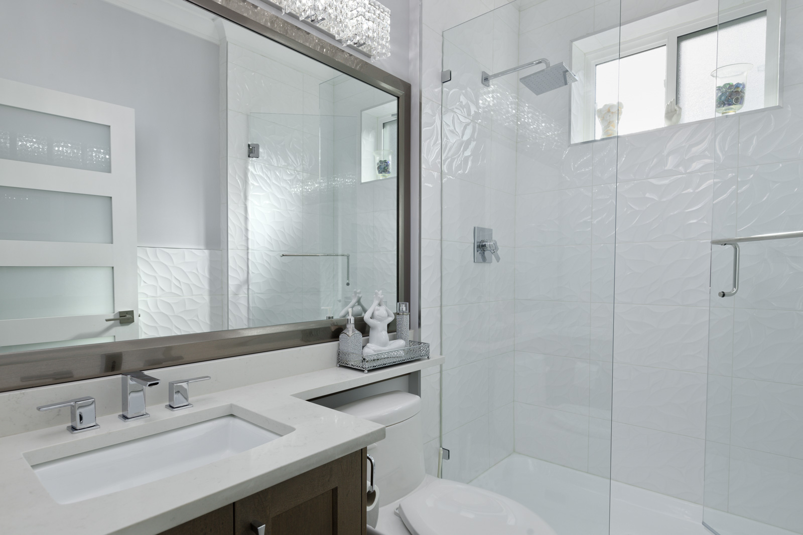 washroom with standing shower, large mirror