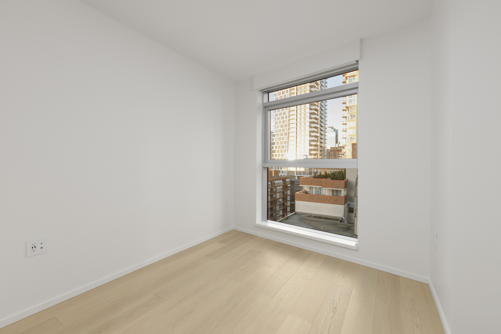 A room with a large window.