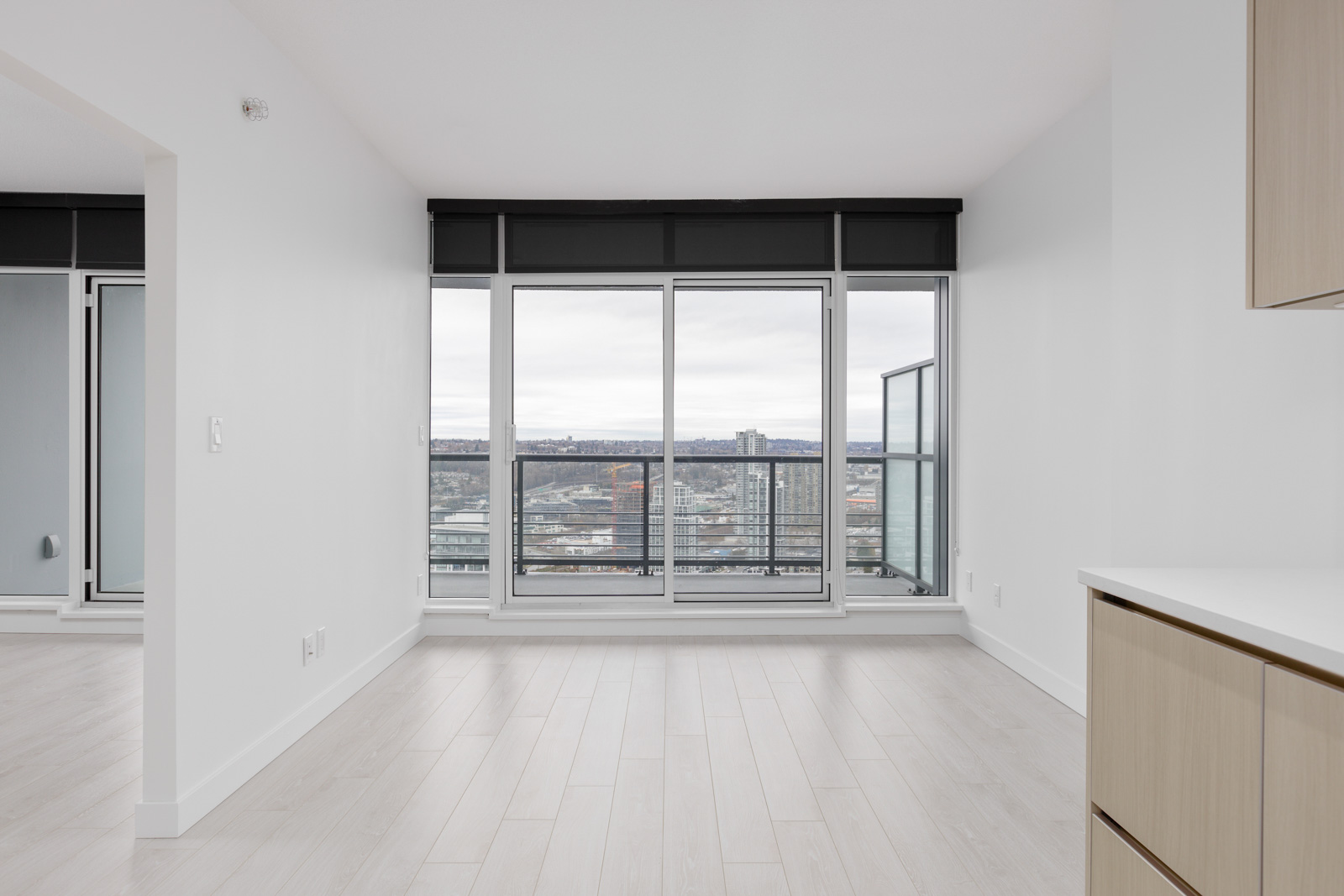 large window and the living room with view of the mountains