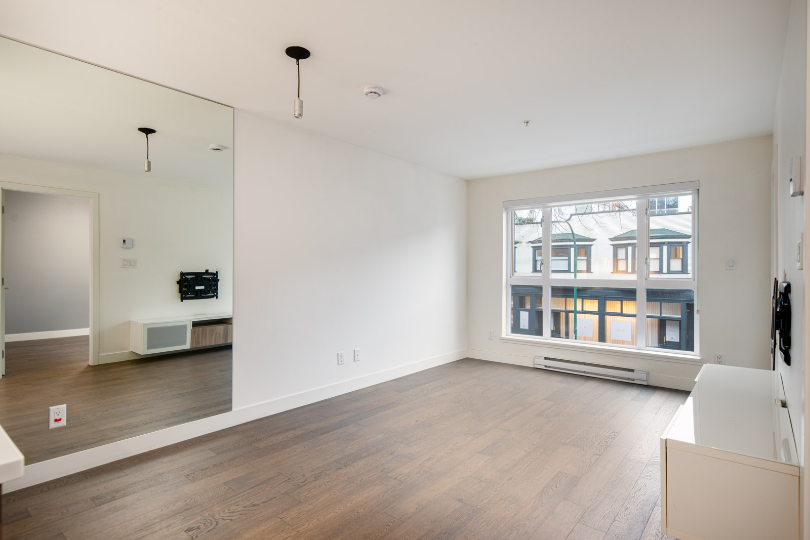 A room with a large mirror.